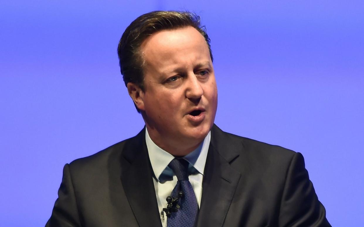 David Cameron criticised Donald Trump's attacks on the media - AFP