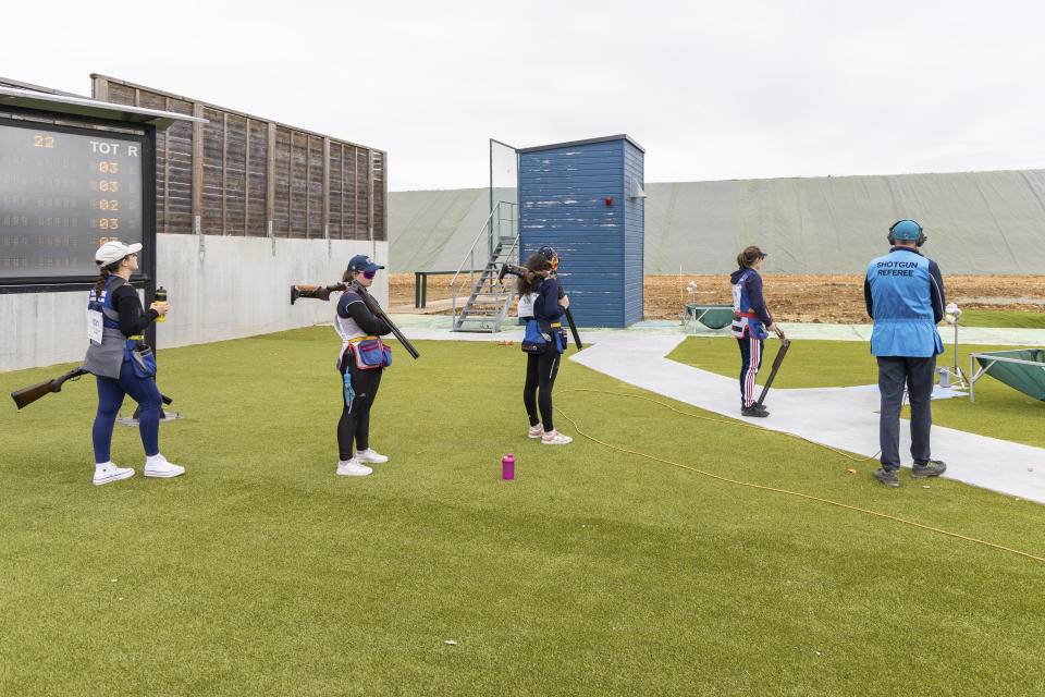 French athletes wait to compete at a clay shooting session at the National Center for Sport Shooting (CNTS) in Chateauroux, central France, Thursday April 11, 2024. The center is the Shooting competition site for the Paris 2024 Olympic Games. (AP Photo/ Yohan Bonnet)