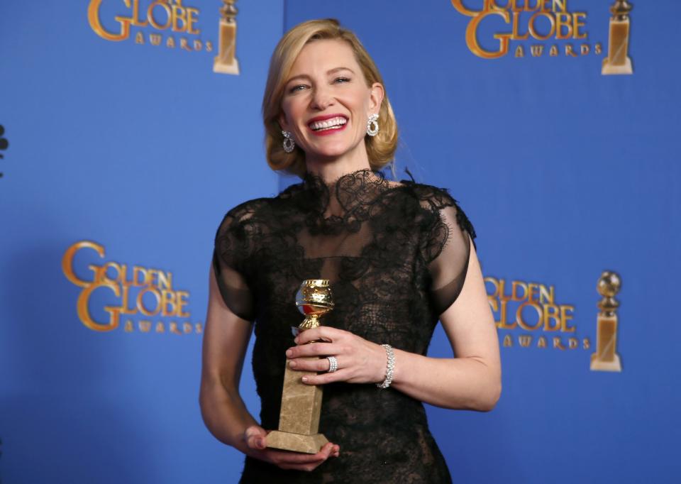 Actress Cate Blanchett poses backstage with her Best Performance by an Actress in a Motion Picture - Drama Award for "Blue Jasmine" at the 71st annual Golden Globe Awards in Beverly Hills