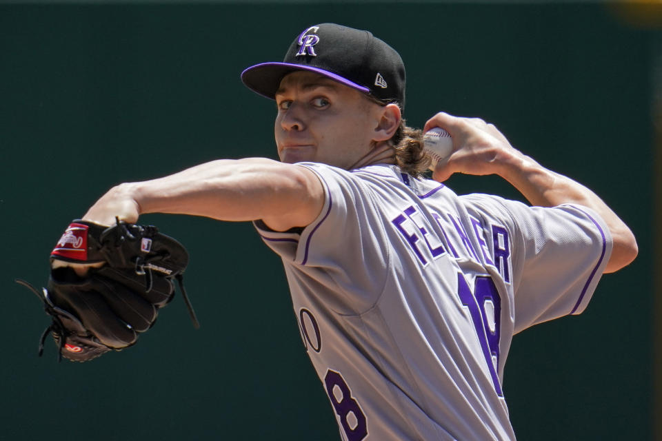 Colorado Rockies starting pitcher Ryan Feltner delivers during the first inning of a baseball game against the Pittsburgh Pirates in Pittsburgh, Wednesday, May 25, 2022. (AP Photo/Gene J. Puskar)