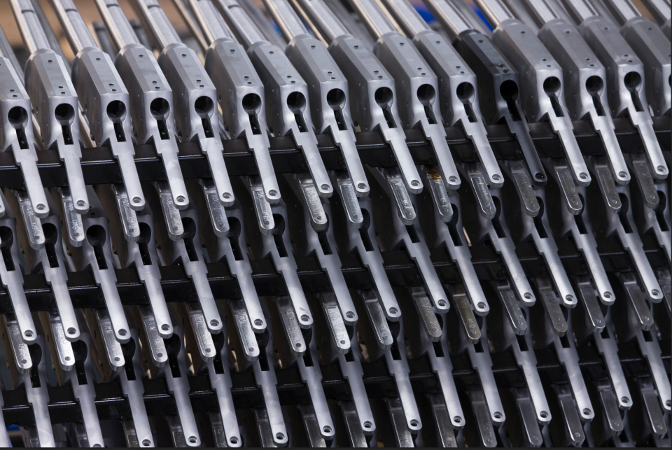 A rack a rifle barrels await assembly Thursday, November 17, 2016, at Henry Repeating Arms in Rice Lake, Wis. Henry Repeating Arms, which is headquartered in Bayonne, N.J.,  dates back to 1860 when Benjamin Tyler Henry invented and patented a repeating rifle during the Civil War.