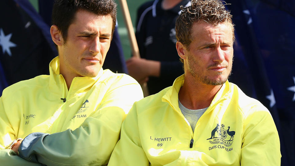 Bernard Tomic and Llewton Hewitt used to be on good terms. (Photo by Robert Prezioso/Getty Images)