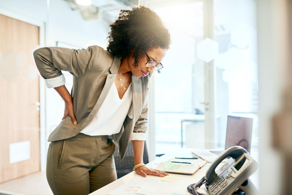 Careers that require heavy lifting or prolonged periods of sitting can lead to lower back problems, which can increase your risk of sciatica. (Photo via Getty Images)