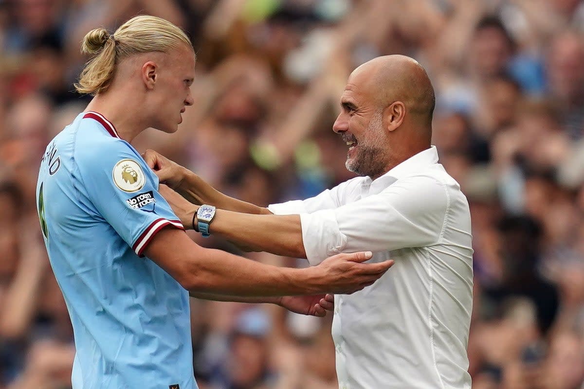 Erling Haaland with Manchester City boss Pep Guardiola (Nick Potts/PA) (PA Wire)