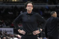 Atlanta Hawks head coach Quin Snyder checks the score board during the first half of an NBA basketball game against the Chicago Bulls in Chicago, Monday, April 1, 2024. (AP Photo/Nam Y. Huh)