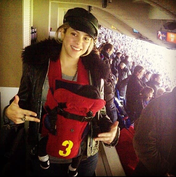 Shakira and her son at his first football match featuring dad Gerard Pique.