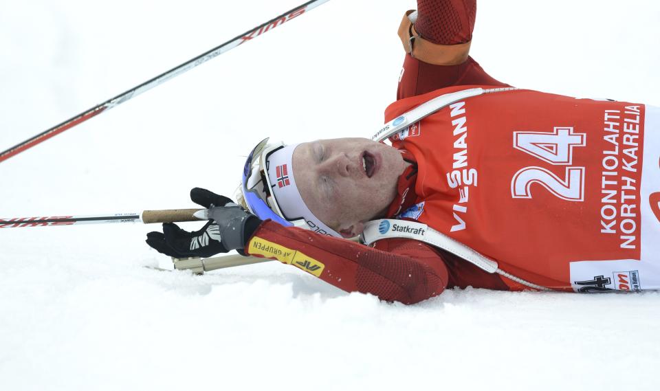 Winner Johannes Thingnes Boe of Norway celebrating after the men's 10 km sprint competition at the E.ON IBU World Cup Biathlon in Kontiolahti, Finland, Thursday March 13, 2014. (AP Photo / LEHTIKUVA, Heikki Saukkomaa) FINLAND OUT - NO SALES