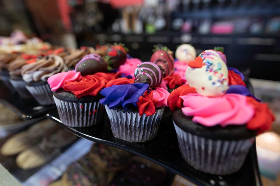Rows of cupcakes of different varieties are available along with other treats at Bite Me Cake Company, 223 S. Union Ave.