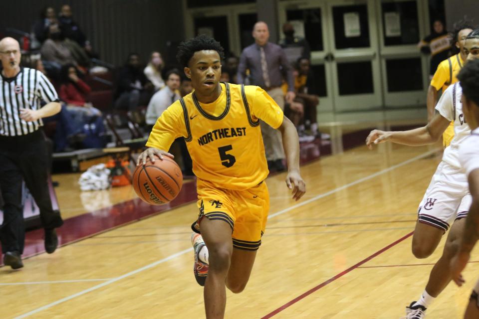 Northeast's Nazier Leonard (5) pushes the tempo on the Eagles' offense against West Creek in the first half during their District 13-4A boys basketball game Friday, Jan. 21, 2022 at West Creek High School.