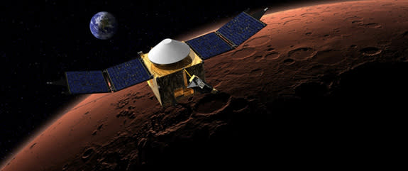 This illustration shows the MAVEN spacecraft in orbit around Mars, imagined with Earth in the background.