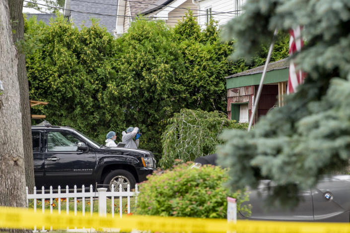 Investigators at the home of Rex Heuermann, a suspect in the Gilgo Beach murders, in Massapequa Park, NY on Friday, July 14, 2023. (Johnny Milano/The New York Times)