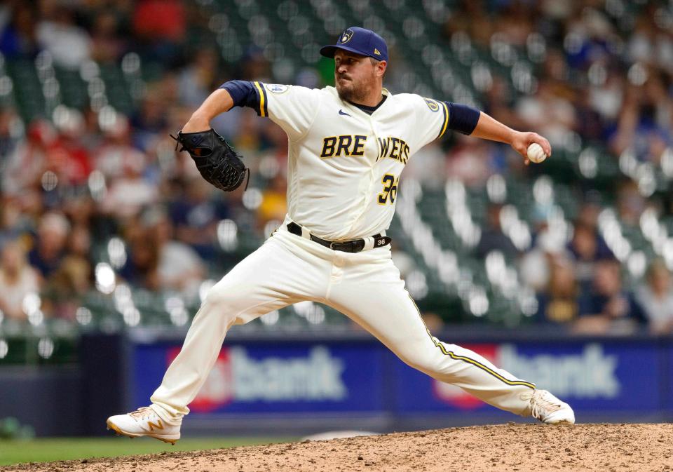 Milwaukee Brewers pitcher Blaine Hardy throws a pitch against the Pittsburgh Pirates during the tenth inning at American Family Field on August 3, 2021 in Milwaukee, Wisconsin.