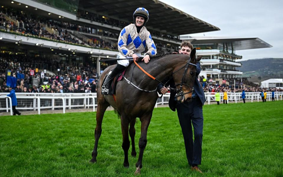 Jockey Rachael Blackmore celebrates aboard Captain Guinness after winning the Champion Chase on day two of the Cheltenham Racing Festival at Prestbury Park in Cheltenham, England