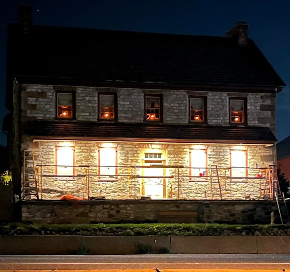 West Manchester Township’s Peter Wolf House glows in the night. The restored stone house was built in then-Manchester Township circa 1756. The house will be featured in a 6 p.m. Jan. 17 episode of “Hometown History,” a streaming and video series exploring local history. The show will include an interview with owners Jan Watt and Steve March.