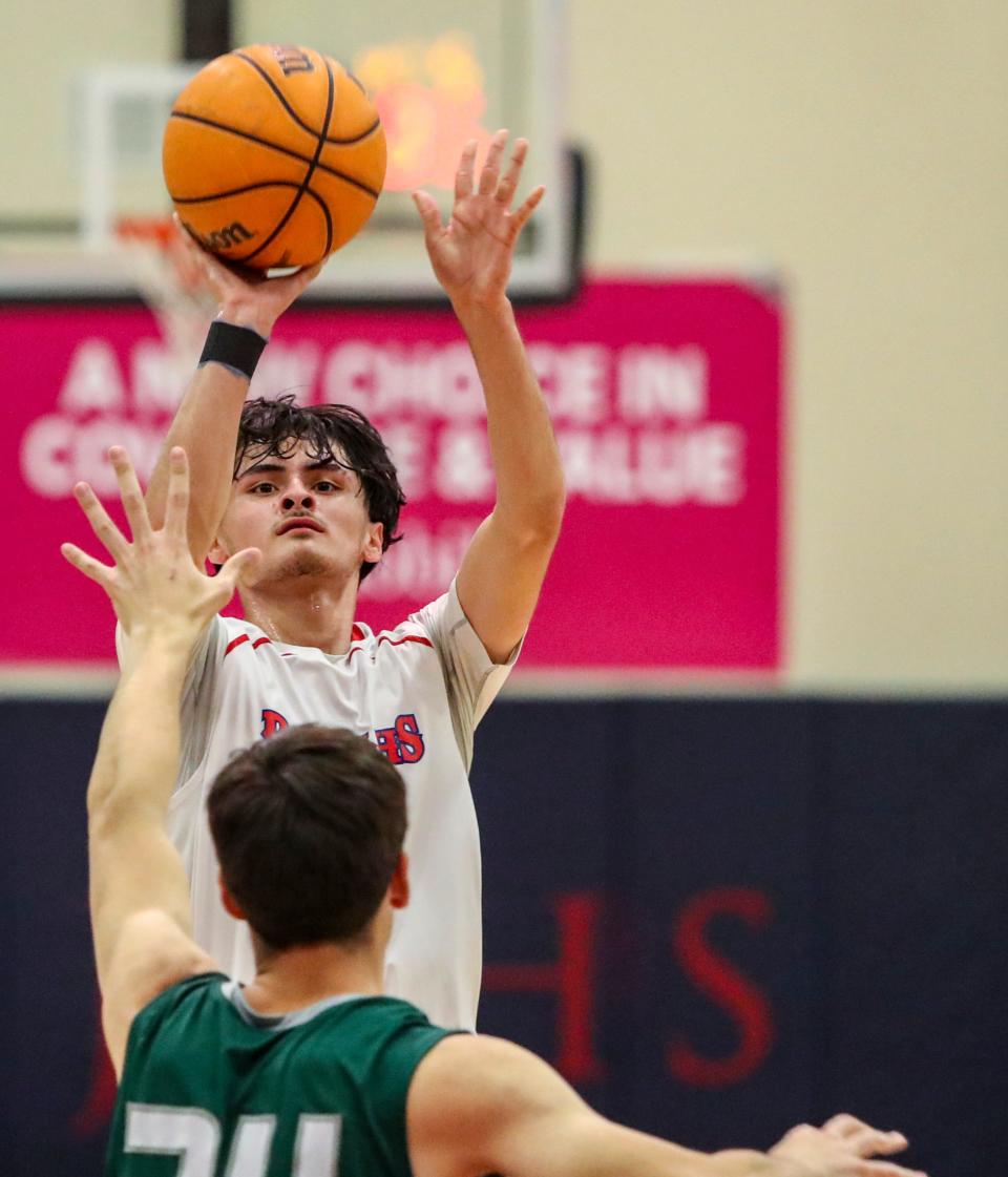 Indio's Jacob Canizales (4) takes a shot during the first quarter of their game at Indio High School in Indio, Calif., Tuesday, Jan. 10, 2023. 