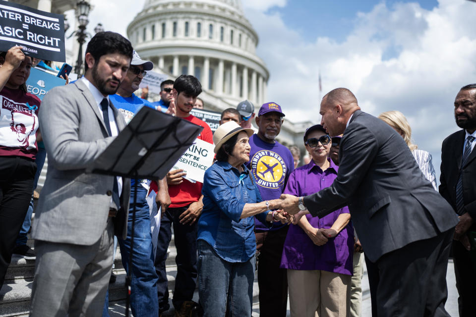 House Minority Leader Hakeem Jeffries, D-N.Y., greets Dolores Huerta, co-founder of the United Farm Workers Union, during a vigil and thirst strike for workers' rights at the U.S. Capitol on July 25, 2023. Rep. Greg Casar, D-Texas, is at left. / Credit: Tom Williams/CQ-Roll Call, Inc via Getty Images