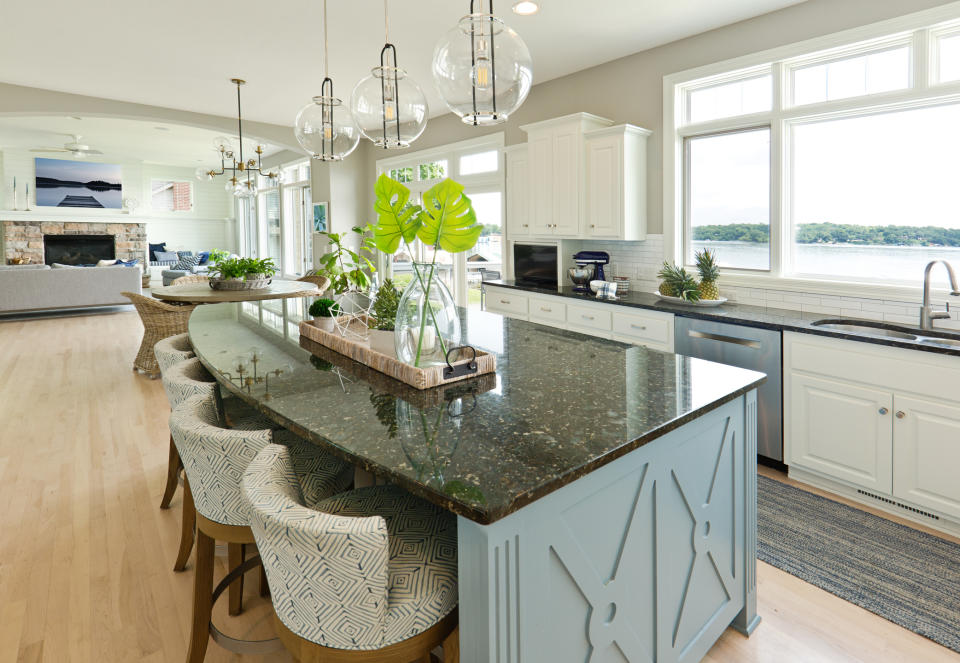 kitchen that transitions into a living area