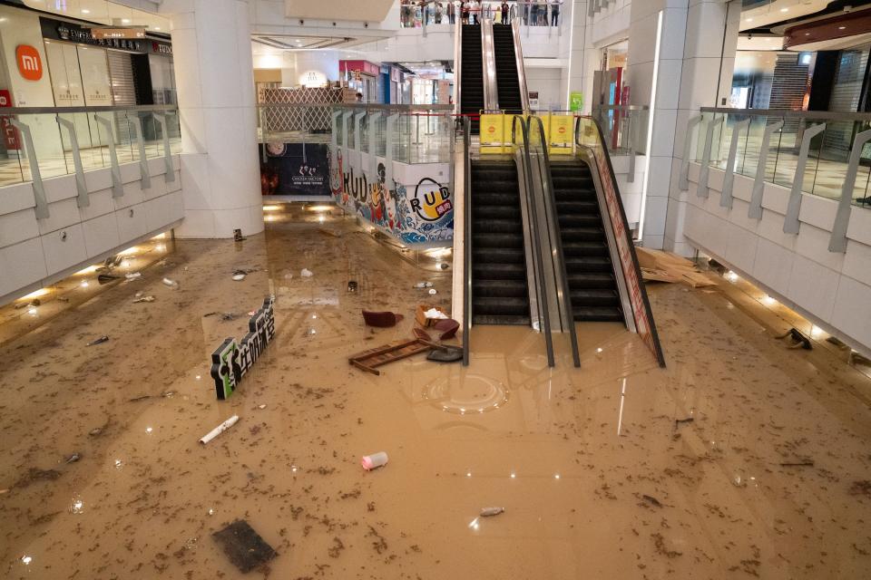 Flood water covers the floor of a shopping mall in Hong Kong on September 8, 2023