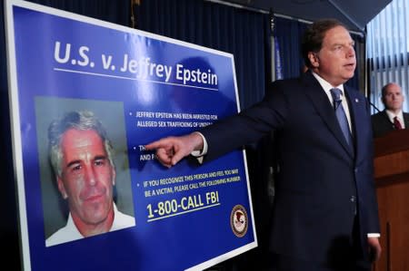 FILE PHOTO: Geoffrey Berman points to a photograph of Jeffrey Epstein in New York