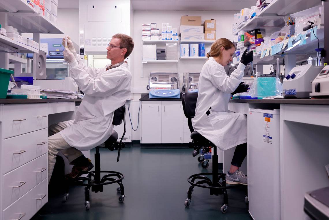 Jack Wilkinson and Anna Matthiadis work in the synthetic biology room at Elo Life Systems on Wednesday, March 8, 2023, in Durham, N.C.