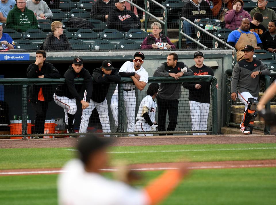 Shorebirds players watch from the dugout in the home opener against the Cannon Ballers Tuesday, April 11, 2023, at Perdue Stadium in Salisbury, Maryland. The Shorebirds defeated the Cannon Ballers 7-2.