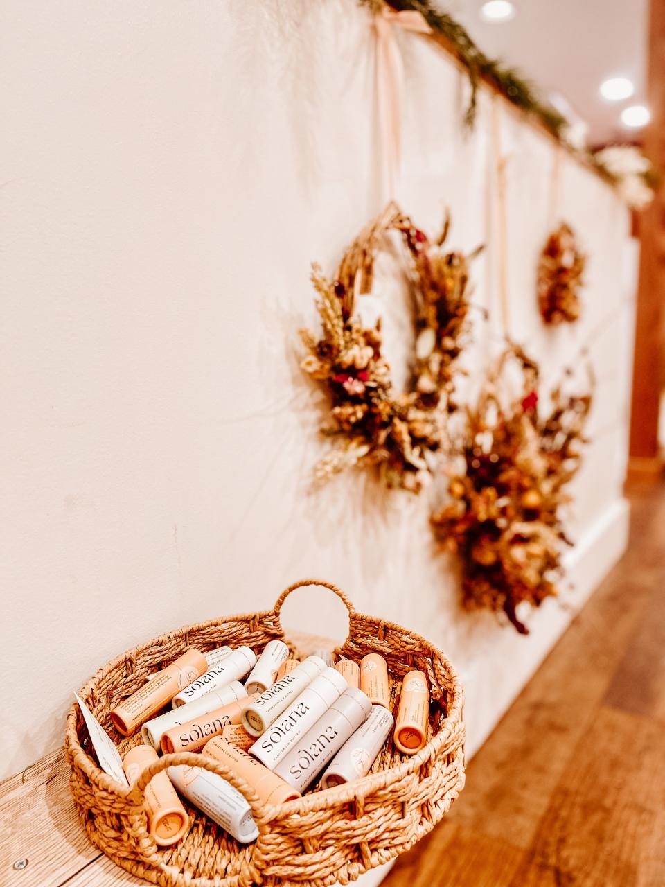 Knoxville’s Solana Simply eco lip butter and Flourish’s handcrafted dried flower wreaths at Cultivate Coffee + Flowers.