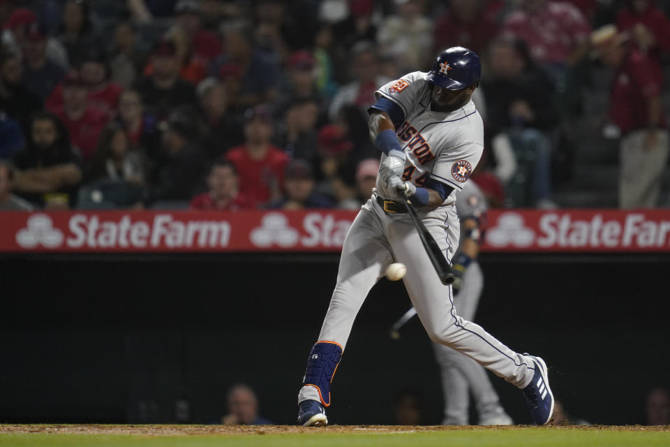 Houston Astros' Yordan Alvarez (44) grounds in to a force out during the sixth inning of a baseball game against the Los Angeles Angels in Anaheim, Calif., Saturday, April 9, 2022. (AP Photo/Ashley Landis)