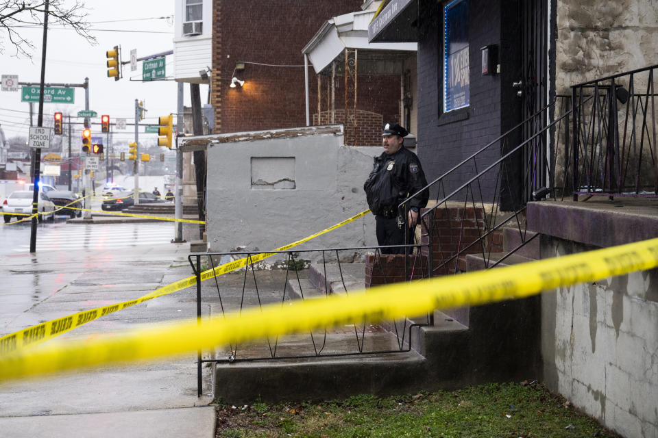 FILE - An officer on scene following a shooting in Northeast Philadelphia on Wednesday, March 6, 2024. The last of four suspects in the shooting that wounded eight Philadelphia high school students at a bus stop earlier this month was captured Tuesday, March 19, in Virginia. (AP Photo/Joe Lamberti, File)