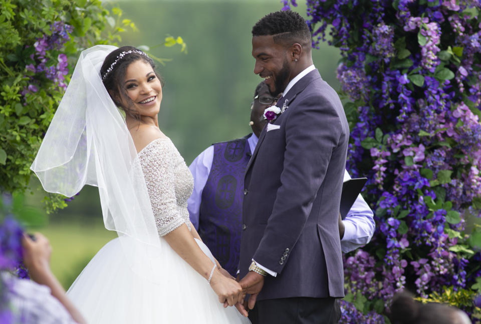 Marissa Blair and Marcus Martin hold hands during the wedding ceremony on May 12, 2018, in Reva, Va. (Photo: Ryan M. Kelly)