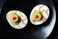 <p>Setting your sights on a fright-filled party spread? Make sure these creepy peepers are included.</p><p><strong><em><a href="https://www.womansday.com/food-recipes/food-drinks/recipes/a11861/guacamoldy-eyeballs-recipe-123432/" rel="nofollow noopener" target="_blank" data-ylk="slk:Get the Guacamoldy Eyeballs recipe.;elm:context_link;itc:0;sec:content-canvas" class="link ">Get the Guacamoldy Eyeballs recipe. </a></em></strong></p>