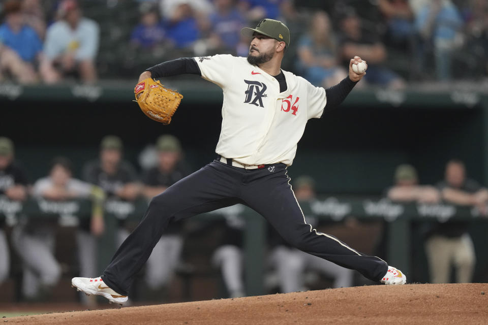 Texas Rangers starting pitcher Martin Perez throws during the second inning of a baseball game against the Colorado Rockies in Arlington, Texas, Friday, May 19, 2023. (AP Photo/LM Otero)