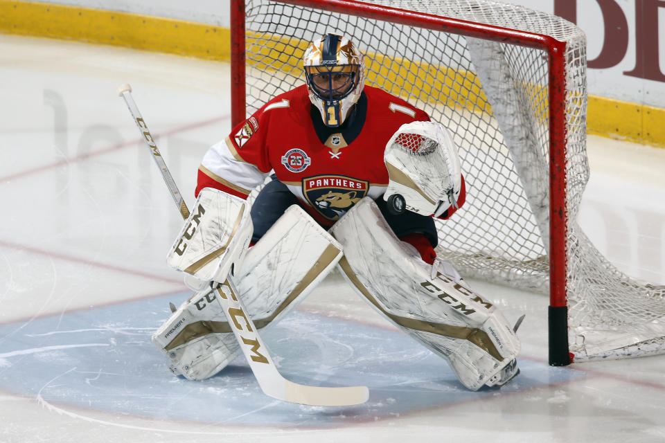 FILE - In this April 6, 2019, file photo, goaltender Roberto Luongo warms up prior to an NHL hockey game against the New Jersey Devils, in Sunrise, Fla. The Panthers are going to send Luongo's No. 1 jersey to the rafters and make him the first player in franchise history to receive that distinction during a ceremony before a game against Montreal, Luongo's hometown team, Saturday, March 7, 2020. (AP Photo/Joel Auerbach, File)