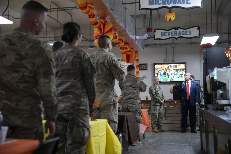President Donald Trump speaks during a surprise Thanksgiving Day visit to the troops, Thursday, Nov. 28, 2019, at Bagram Air Field, Afghanistan. (AP Photo/Alex Brandon)