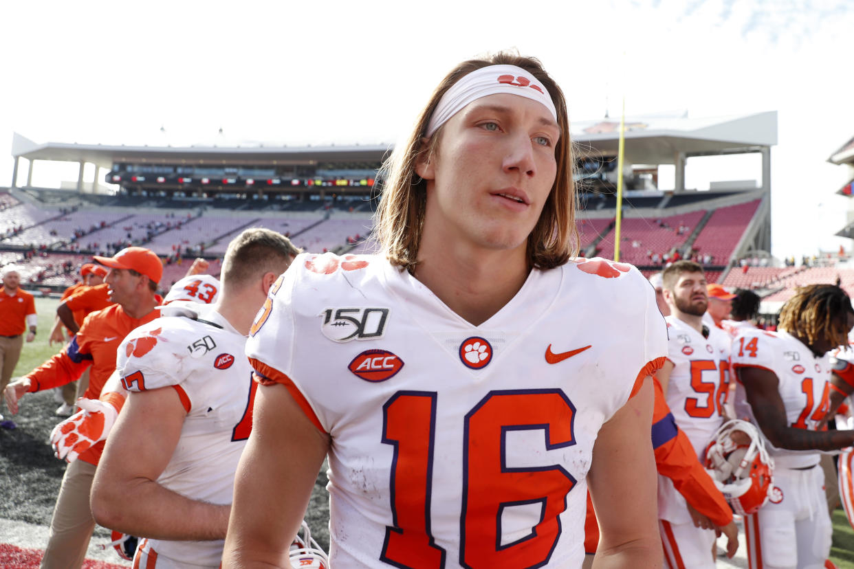 Clemson Tigers quarterback Trevor Lawrence (16) walks off the field after the game against the Louisville Cardinals at Cardinal Stadium. (USAT)