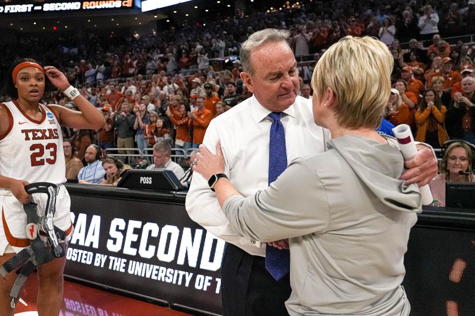 Texas women's basketball coach Vic Schaefer and Alabama's Kristy Curry exchange greetings after the Longhorns' win in the second round of the NCAA Tournament in March. Schaefer coached Mississippi State from 2012-20 and knows all too well how tough the new SEC will be.