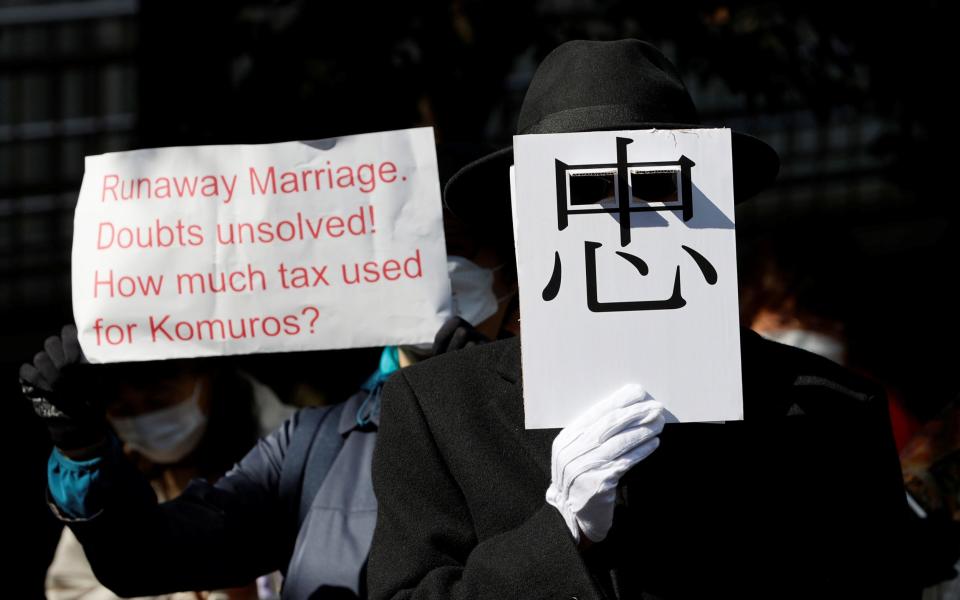 Protesters against the marriage marched through Tokyo on Tuesday - REUTERS