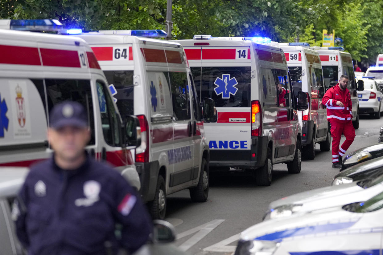 Police blocks street around the Vladislav Ribnikar school in Belgrade, Serbia, Wednesday, May 3, 2023. A teenage boy opened fire early Wednesday in a school in central Belgrade, causing injuries. (AP Photo/Darko Vojinovic)