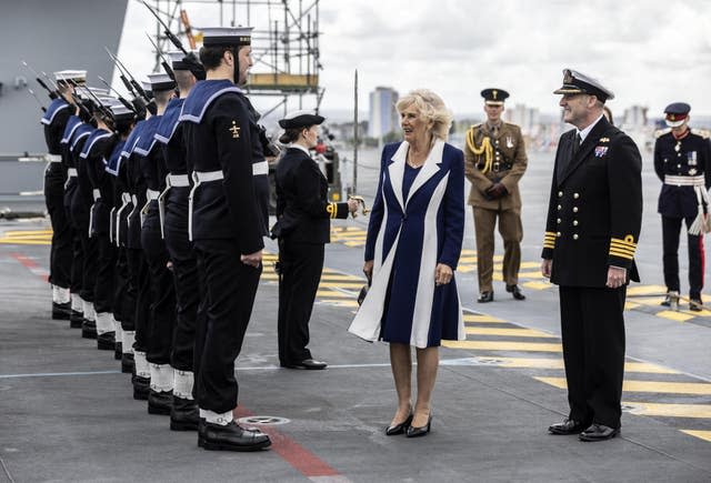 Camilla is greeted by a guard of honour 