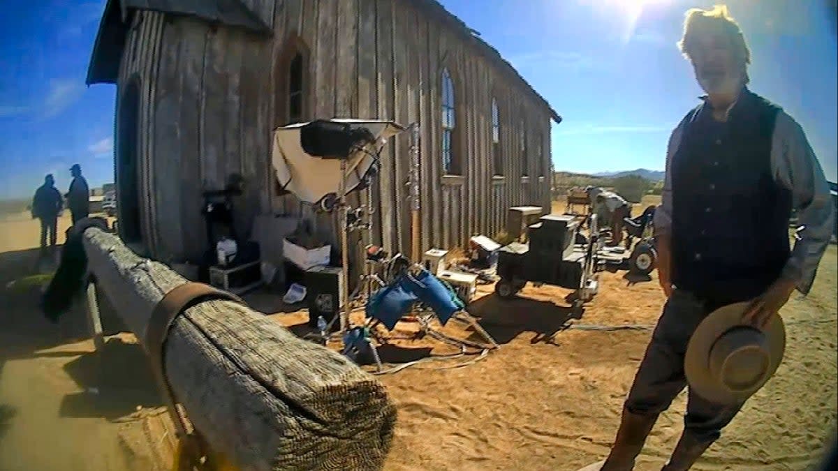 In this image taken from video released by the Santa Fe County Sheriff's Office, Alec Baldwin speaks with investigators following a fatal shooting on a movie set in Santa Fe, New Mexico  (SFSO)