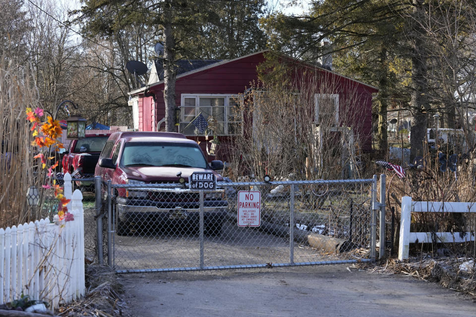 Exterior scene of the residence of Anthony McRae, in Lansing, Mich., Tuesday, Feb. 14, 2023. McRae, the 43-year-old suspected gunman killed himself hours after fatally shooting three students at Michigan State University in East Lansing on Monday night. (AP Photo/Carlos Osorio)