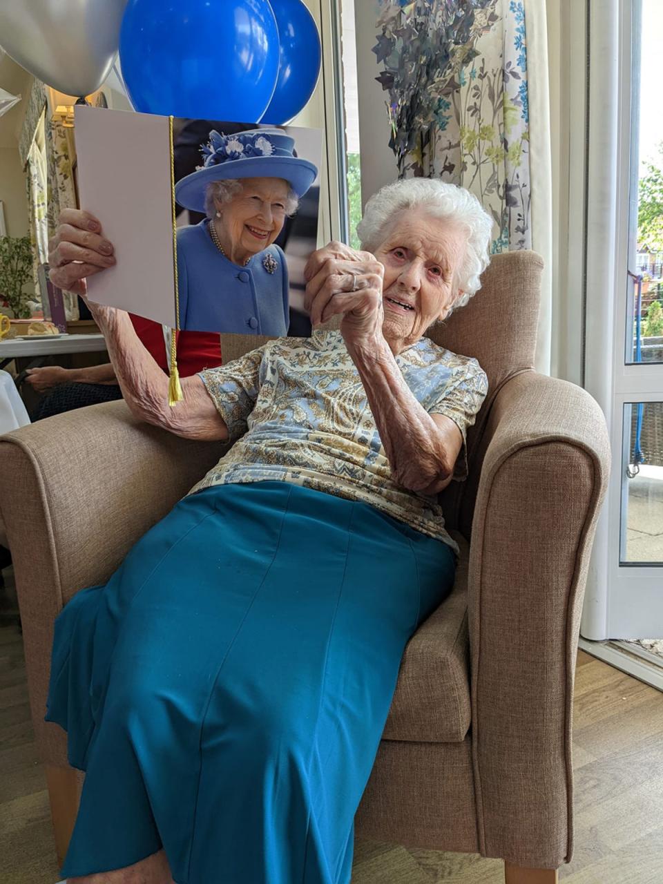 Norah opening one of her 200 birthday cards (Collect/PA Real Life)