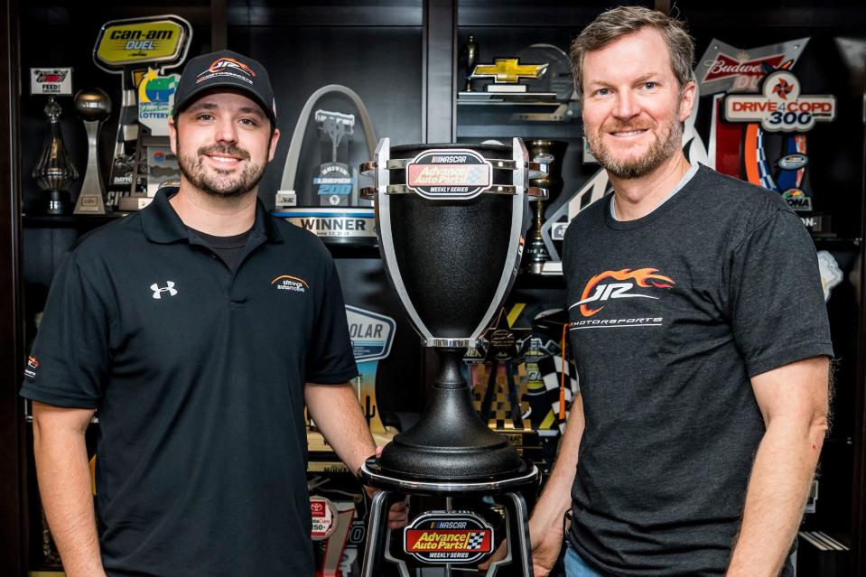 Advance Auto Parts delivers the weekly series championship trophy to Josh Berry, driver of the #88 All Things Automotive Chevrolet, (driver) and Dale Earnhardt Jr. (car owner) at the JR Motorsports facility in Mooresville, NC. November 17, 2020. (Reagen Lunn/NASCAR)