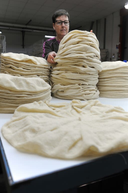 An employee works on a beret at Laulhere factory in Oloron Sainte-Marie, in the French Basque region of southwestern France, on May 19, 2016