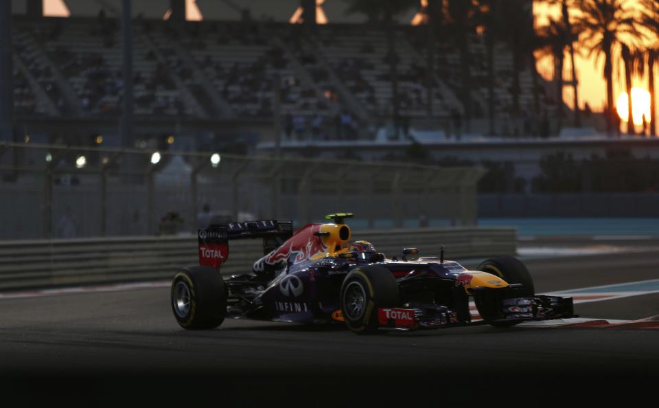 Red Bull Formula One driver Mark Webber of Australia takes a corner during the qualifying session of the Abu Dhabi F1 Grand Prix at the Yas Marina circuit on Yas Island, November 2, 2013. REUTERS/Ahmed Jadallah (UNITED ARAB EMIRATES - Tags: SPORT MOTORSPORT F1)