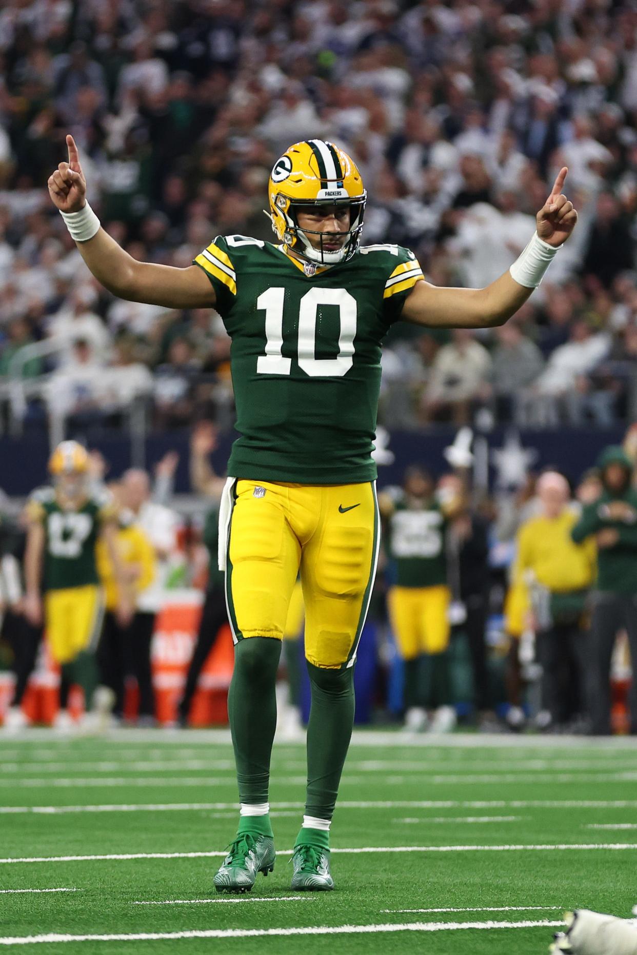 Jan 14, 2024; Arlington, Texas, USA; Green Bay Packers quarterback Jordan Love (10) reacts after a touchdown against the Dallas Cowboys in the first quarter for the 2024 NFC wild card game at AT&T Stadium. Mandatory Credit: Tim Heitman-USA TODAY Sports ORG XMIT: IMAGN-746122 ORIG FILE ID: 20240114_mcd_sh2_181.JPG