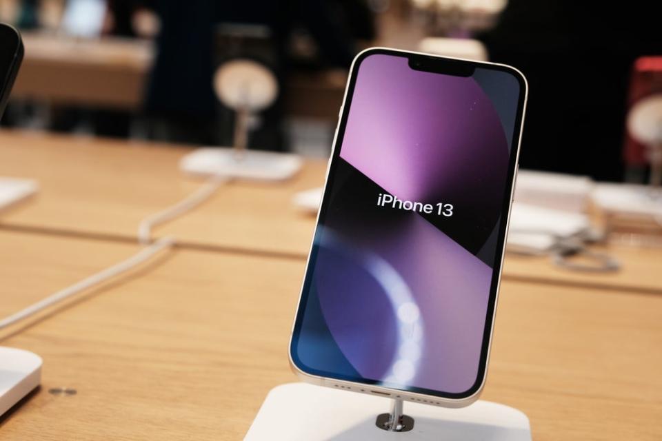 File: A new iPhone 13 on display at the Fifth Avenue Apple Store during the launch of the phones on 24 September 2021 in New York City (Getty Images)