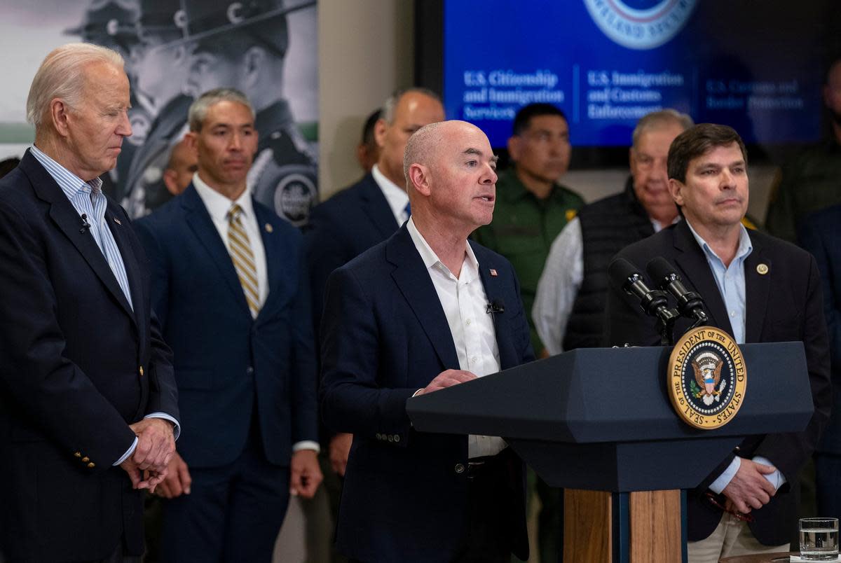 U.S. Secretary of Homeland Security Alejandro Mayorkas, center, gives remarks during a visit to Brownsville while President Joe Biden, San Antonio Mayor Ron Nirenberg and U.S. Rep. Vicente Gonzalez, D-McAllen listen on Thursday, Feb. 29, 2024.