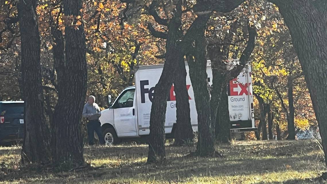 Investigators were seen surrounding a parked FedEx truck on Faith Trail in Wise County around 3:20 p.m. on Friday, Dec. 2, 2022, hours before they announced they had found Athena Strand’s body.