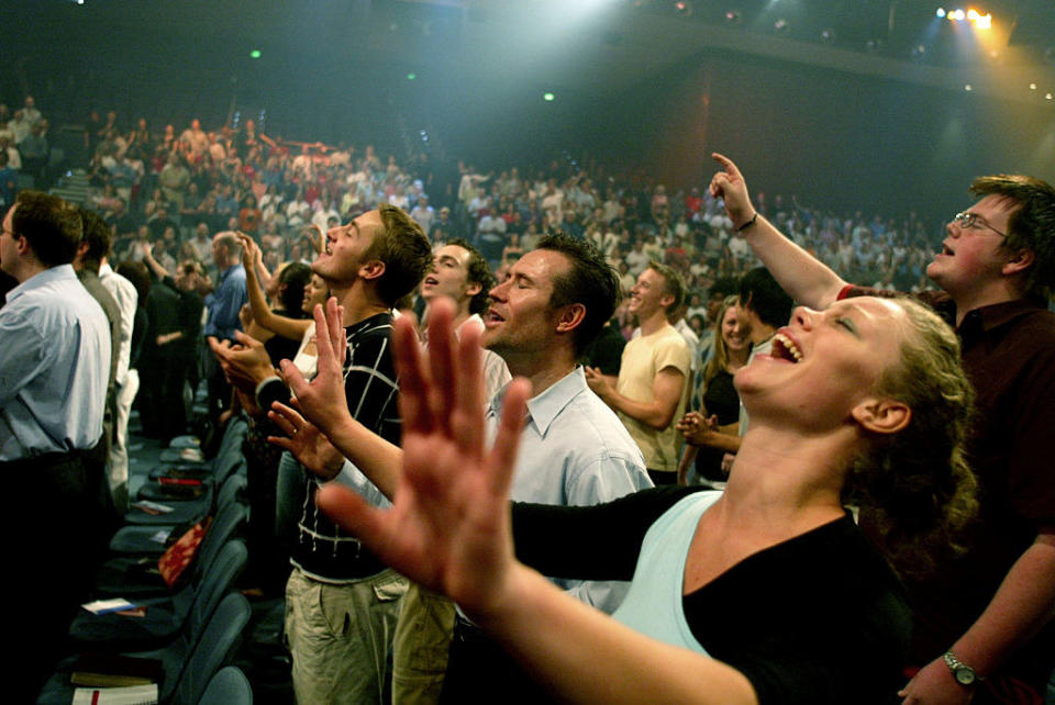 A crowd in a mega church