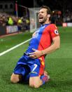 <p>Luka Milivojevic celebrates making it 3-0 from the penalty spot</p>